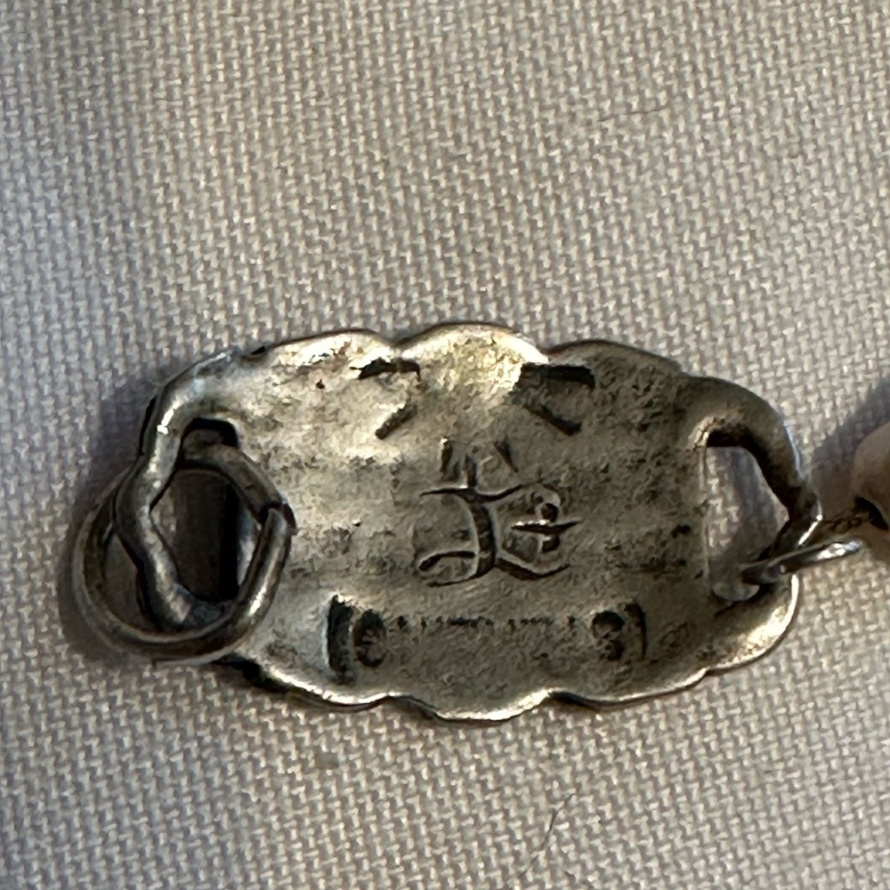 Vintage Silver Pendant with Intricate Design